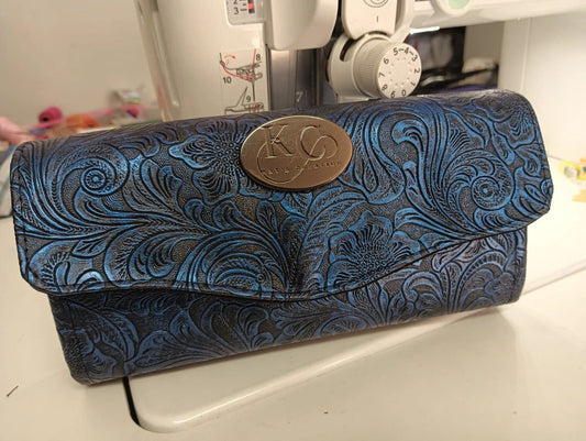 Blue embossed Necessary Clutch Wallet Seconds